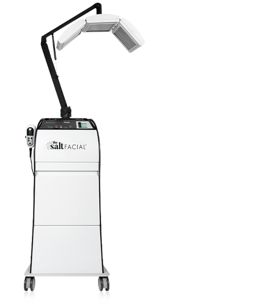 White facial treatment machine with 'The Salt Facial' logo on a white background. It is the best LED device purchase.