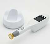 A handheld non-invasive plasma treatment device with a gold tip component lying on a surface. It is a great plasma device purchase.